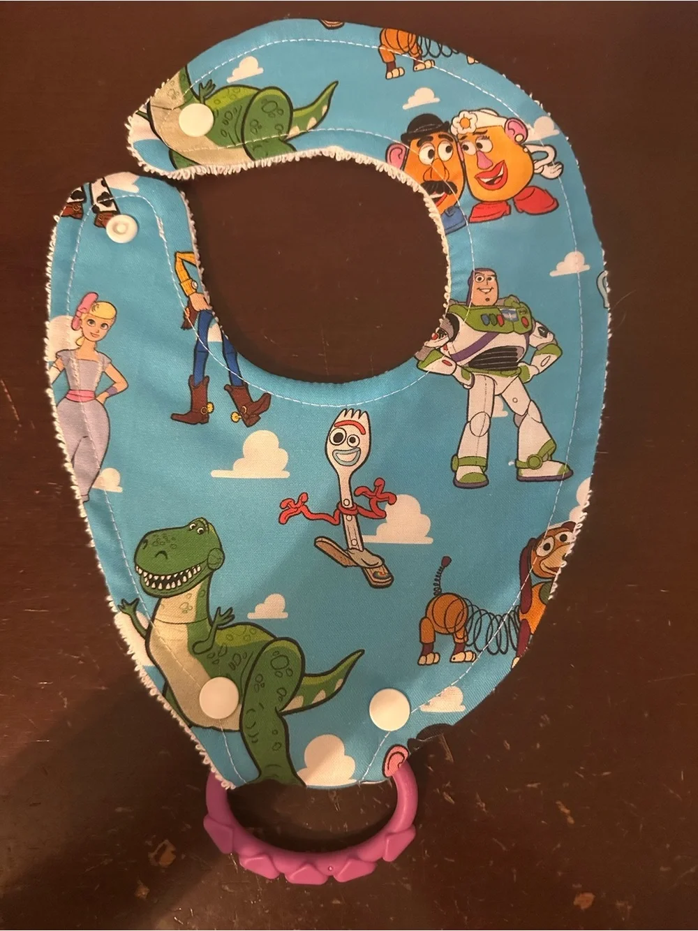 Handmade Toy Story bib with ring
